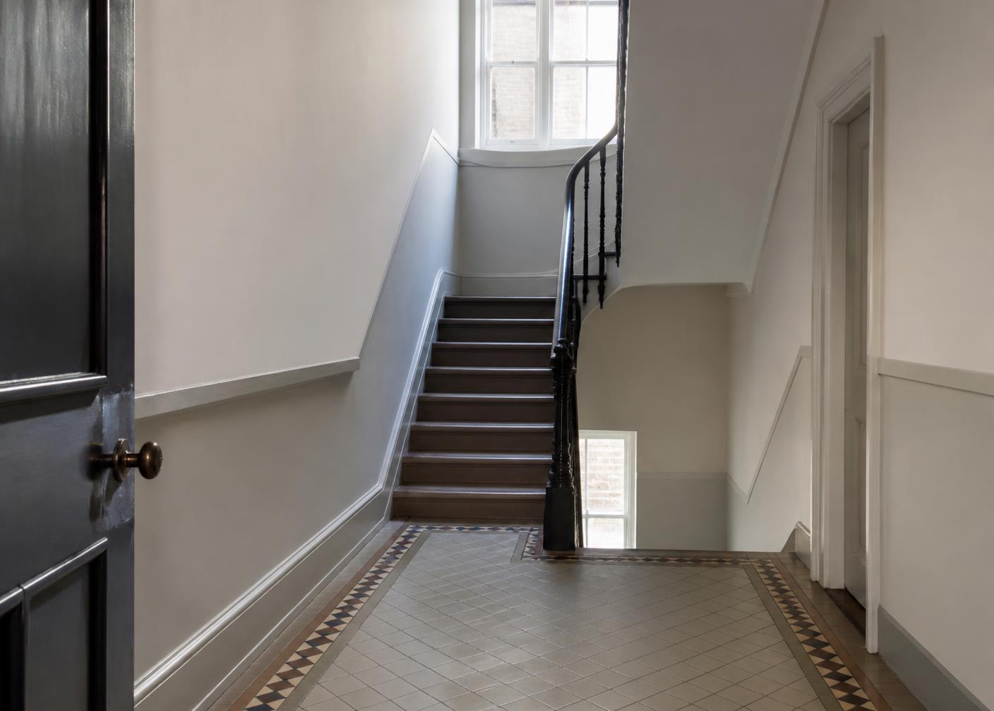 Cleaned communal hallway and staircase inside a London converted property